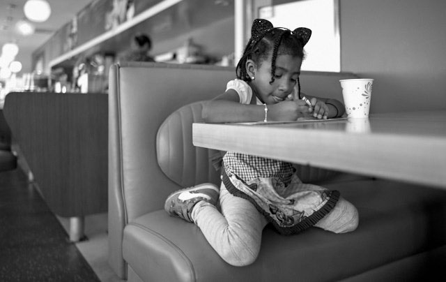 Glad to see a child using real paper and pen and not a device. Mad her three prints. Leica M Monochrom with Leica 28mm Summilux-M ASPH f/1.4. © Thorsten Overgaard. 